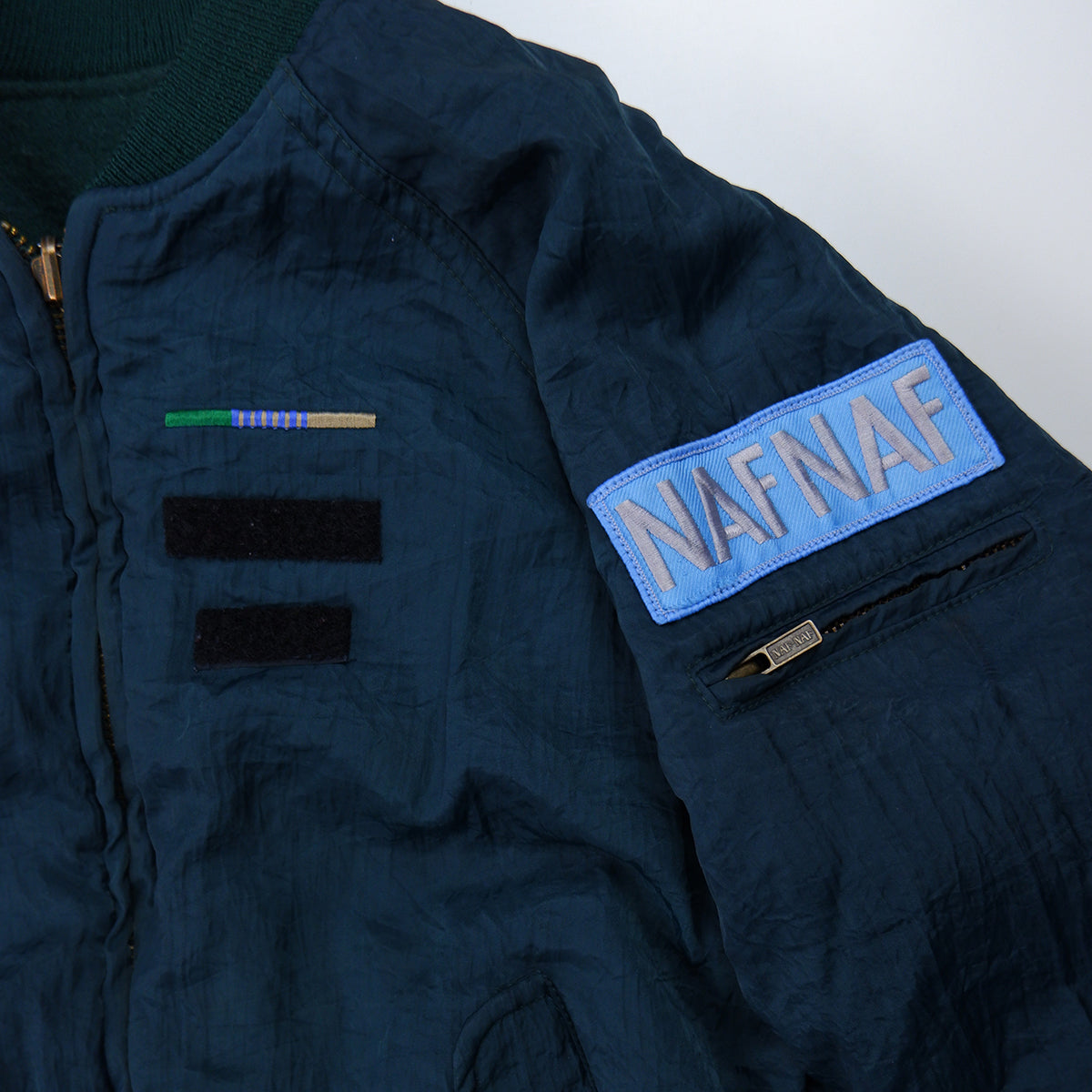 Reversible jacket with vintage patch