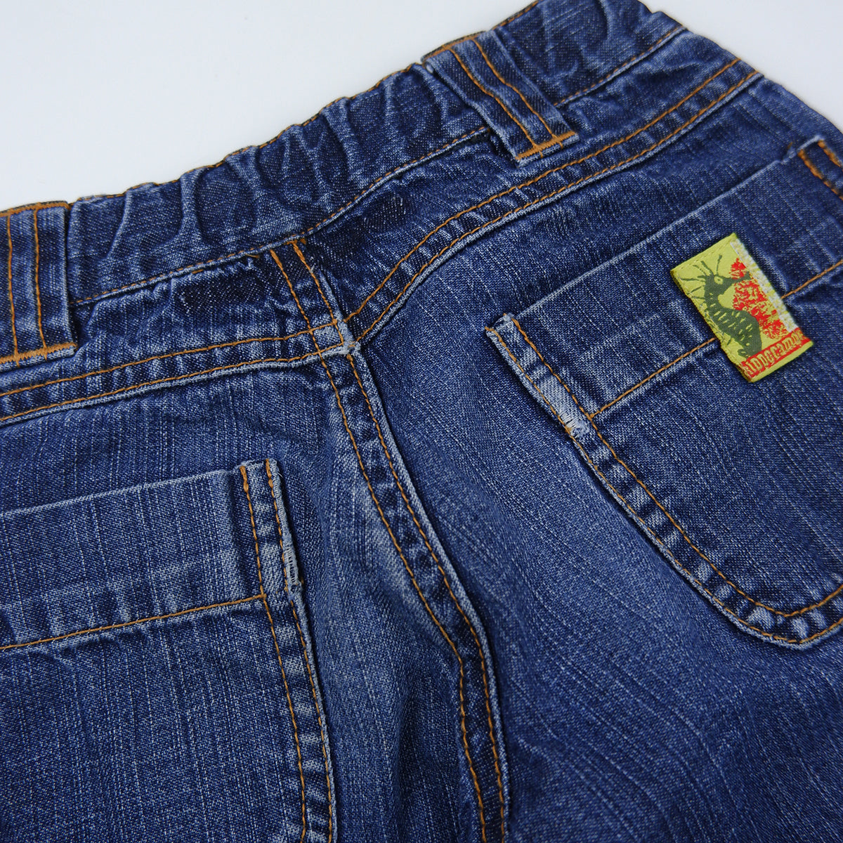 Vintage topstitched blue jeans