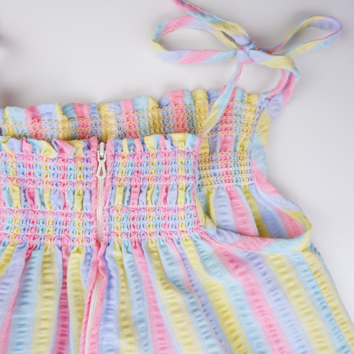 combinaison à rayures pastel vintage pour bébé